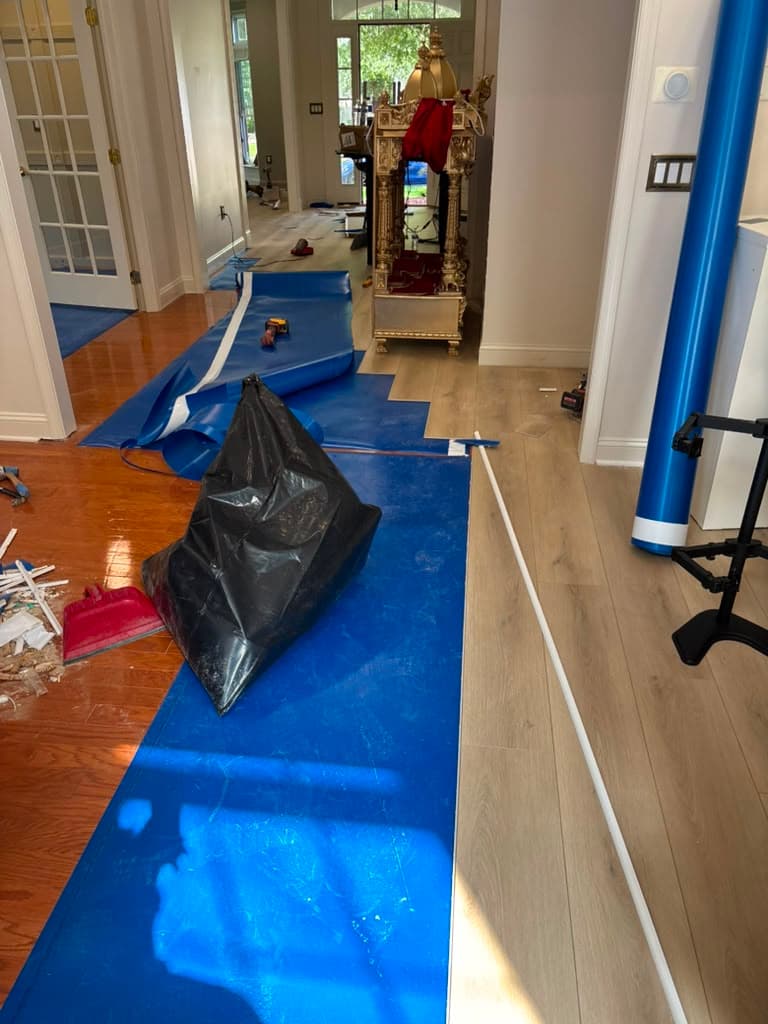 Old hardwood floor before LVP installation